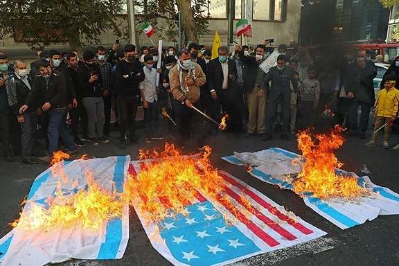 Government supporters in Iran burning American and Israeli flags, November 4, 2021
