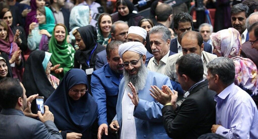 Molavi Abdolhamid among supporters before the current protests began (file photo)