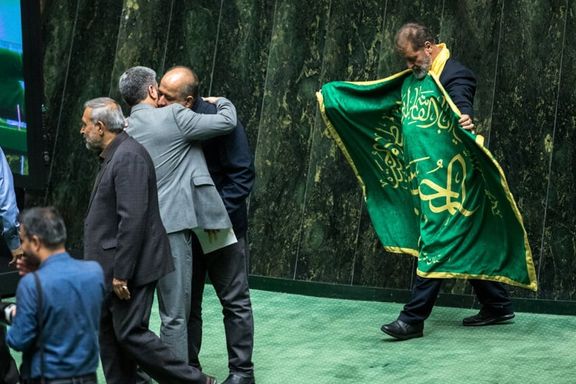 Denial dominates Iran’s parliament, but sanctions toll hard to ignore