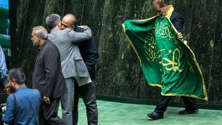 Denial dominates Iran’s parliament, but sanctions toll hard to ignore