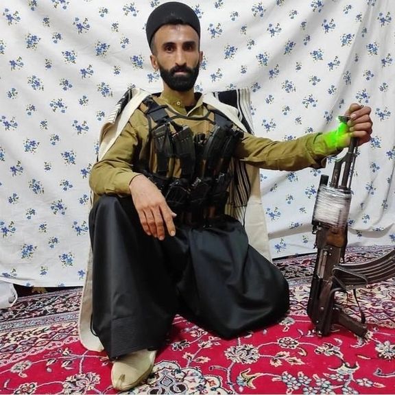 Hossein Saeedi, one of the armed rebels in his tribal costume, killed in Izeh on December 20, 2022