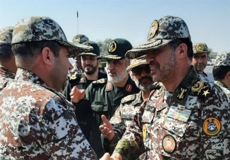 The commander of Iran's Joint Air Defense Headquarters Alireza Sabahifard Amir meets with Ali Hajizadeh, the commander of the Aerospace Division of the Revolutionary Guards.