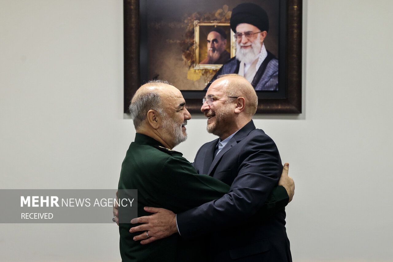 Iran’s parliament speaker Mohammad Bagher Ghalibaf hugging Hossein Salami, the commander-in-chief of the Islamic Revolutionary Guard Corps (IRGC)  