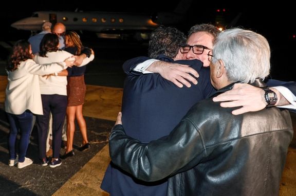 Family members embrace freed Americans Siamak Namazi, Morad Tahbaz and Emad Shargi — as well as two returnees whose names have not yet been released arrive at Davison Army Airfield at Fort Belvoir, Virginia, September 19, 2023.