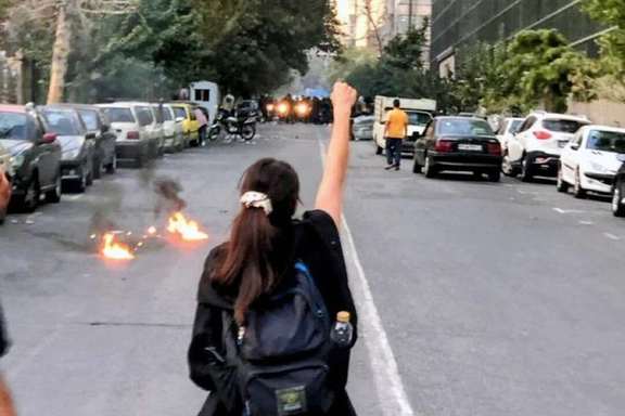 A teenager defying security forces in Rasht on Sept. 20, 2022