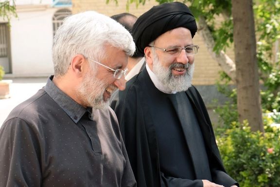 Iranian hardliner politician Saeed Jalili (left) and President Ebrahim Raisi