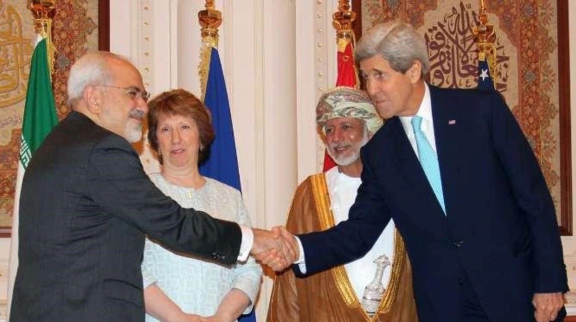 Former foreign minister Mohammad-Javad Zarif (left) and former US secretary of state John Kerry  (undated)
