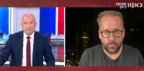 تصویری از مصاحبه خبرنگار بیلد (سمت راست) با شبکه کان اسرائیل