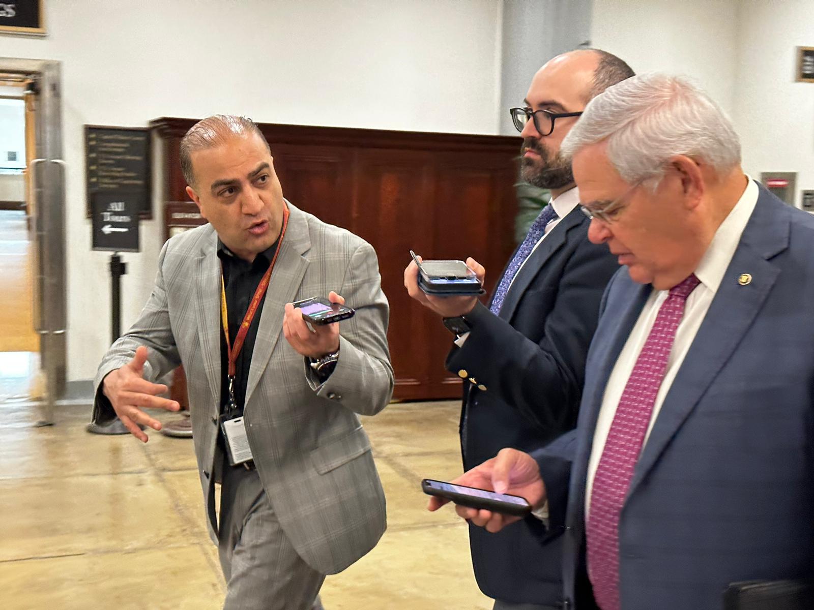 Senator Bob Menendez (D-NJ) (right) talking to Iran International’s Arash Aalaei (left) on June 8, 2023 