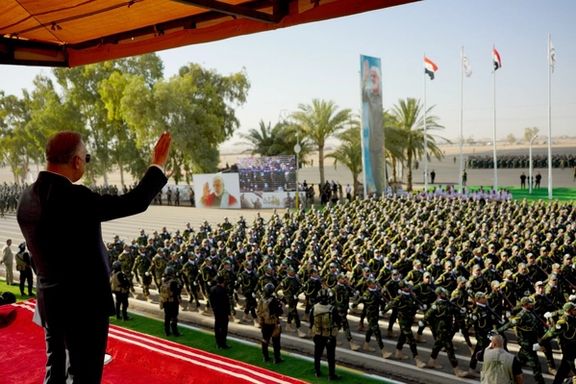 Iraqi Prime Minister Mustafa al-Kadhimi during a military parade by Iran-backed Shiite militia Hashd al-Shaabi, also known as Popular Mobilization Forces in the town of al-Khalis, Diyala province, eastern Iraq, on July 23, 2022