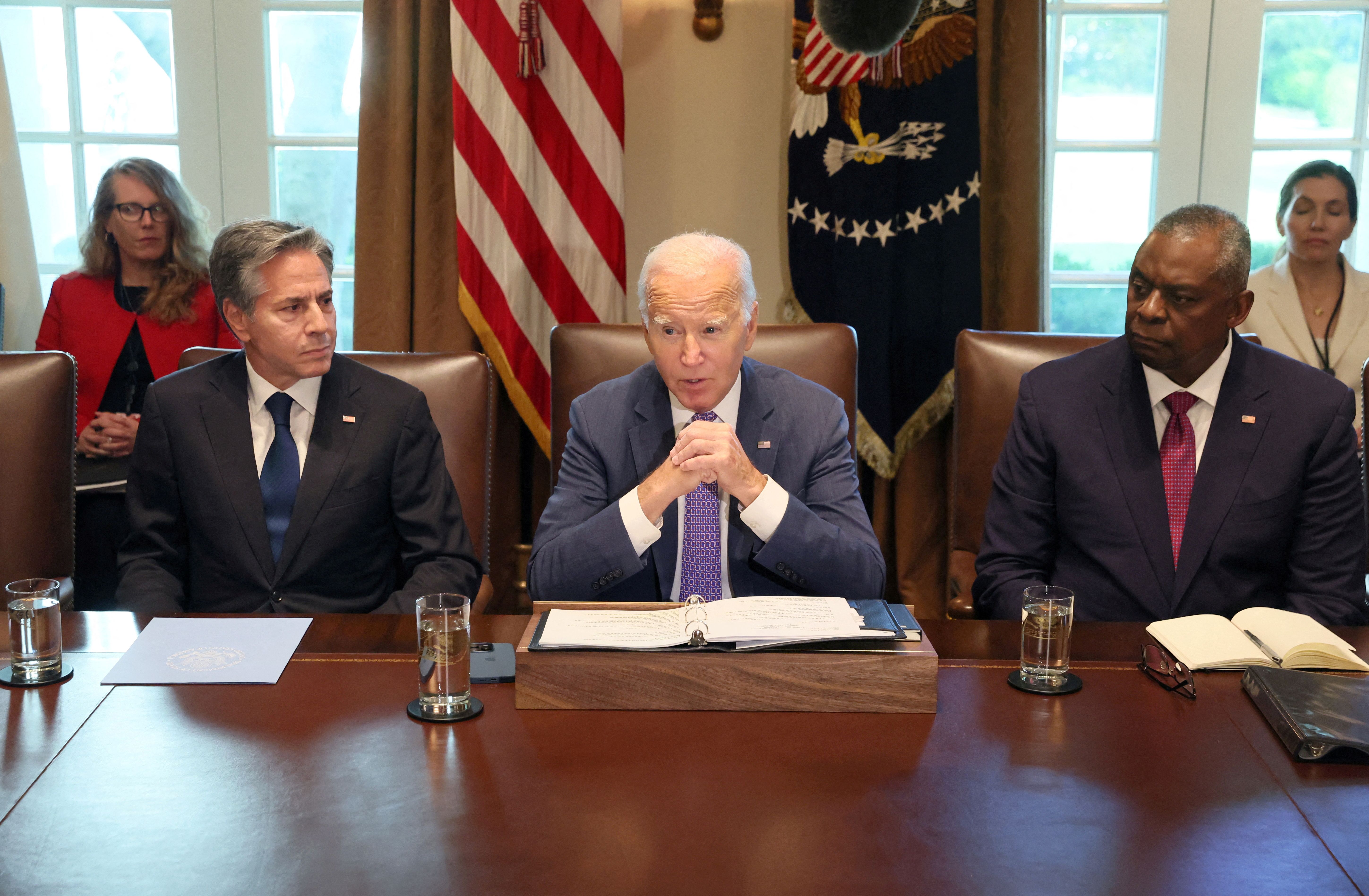 Secretary of State Antony Blinken and Secretary of Defense Lloyd Austin with President Joe Biden
