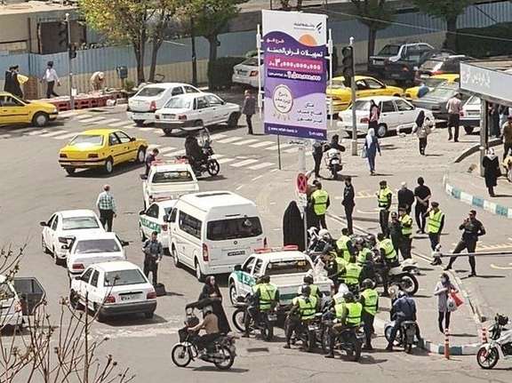 Hijab police agents seen in a street in Tehran. Undated