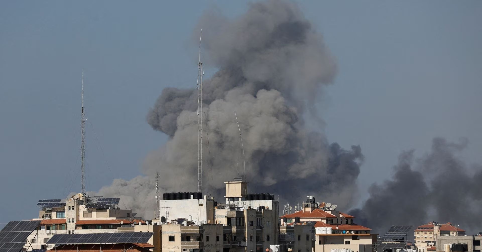 Smoke rises following Israeli strikes in Gaza, October 12, 2023. 