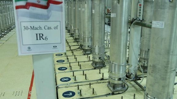 A cascade of centrifuges enriching uranium in an Iranian underground facility