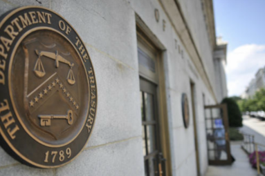 A bronze seal for the Department of the Treasury is shown at the US Treasury building in Washington