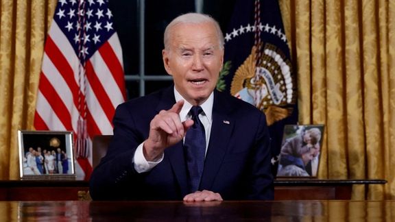 US President Joe Biden delivering an address to the nation about his approaches to the conflict between Israel and Hamas from the Oval Office of the White House in Washington, October 19, 2023