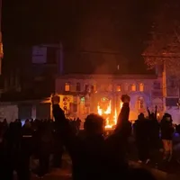 Witnesses describe gunfire, blocked exits and deadly market fire in Rasht