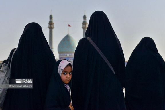 Women wearing Islamic Republic’s preferred hijab covering the whole body (chador)