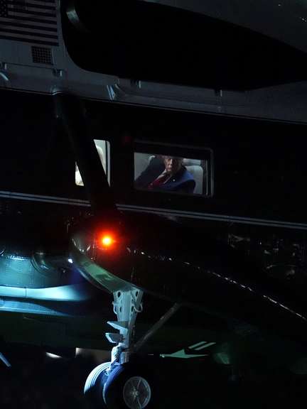US President Donald Trump looks on before disembarking Marine One at the Ellipse near the White House, in Washington, DC, on August 5, 2026.