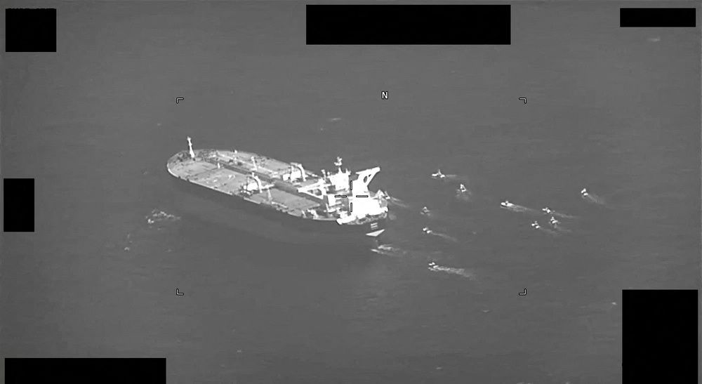 Fast-attack crafts from IRGC Navy swarming oil tanker Niovi as it transits the Strait of Hormuz, May 3, 2023