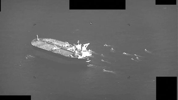 Fast-attack crafts from IRGC Navy swarming oil tanker Niovi as it transits the Strait of Hormuz, May 3, 2023