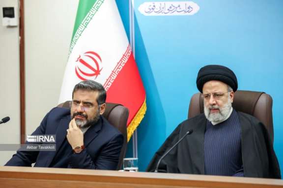 Iran's President Ebrahim Raisi (right) and Mohammad Mahdi Esmaeili, the minister of culture and Islamic guidance, during a meeting on January 16, 2024