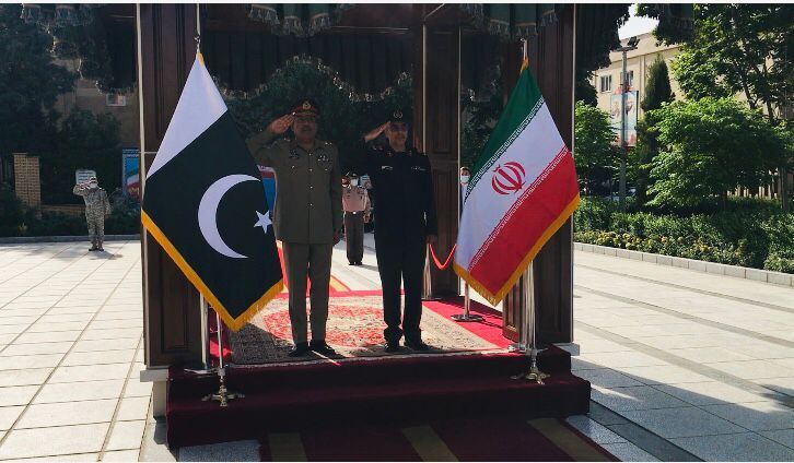Chairman of the Chiefs of Staff of the Iranian Armed Forces Major General Mohammad Baqeri (R) and his Pakistani counterpart Lieutenant General Nadim Reza Nishan in Tehran on June 26, 2022 