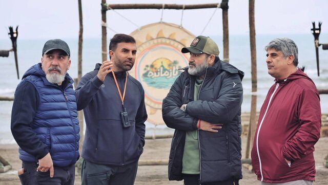 Siamak Ansari (left) and Mehran Ghafourian (2nd left) behind the scenes of the show  (undated)