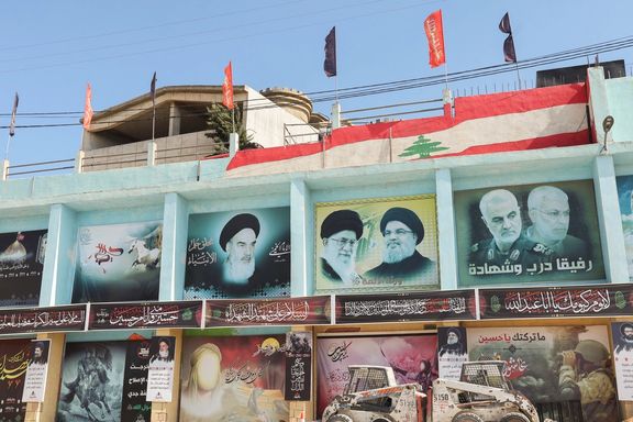 A picture showing Lebanon's Hezbollah leader Hassan Nasrallah and Iran's Supreme Leader Ali Khamenei in the town of Yaroun, southern Lebanon, from where the family of Hadi Matar emigrated to the US, August 13, 2022.