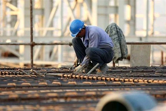 An Iranian construction worker
