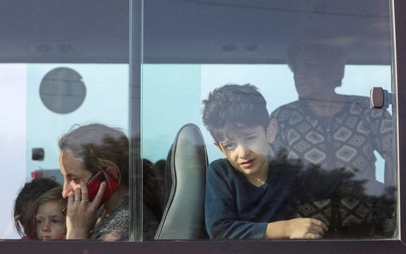 Refugees from Nagorno-Karabakh region are seen in a bus upon their arrival at a checkpoint in the village of Kornidzor, Armenia, September 24, 2023.
