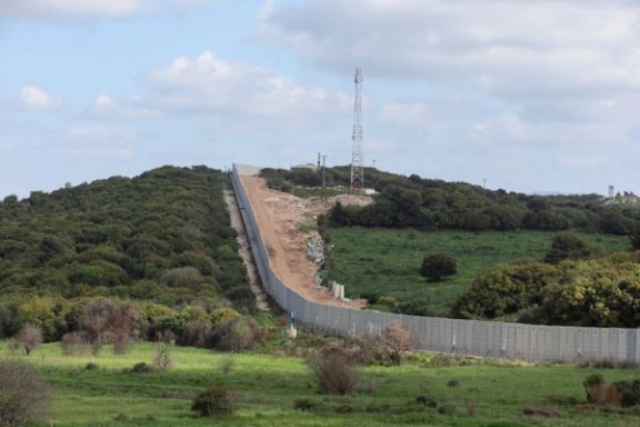 A view shows a border wall between Lebanon and Israel as seen from the Lebanese town of Marwahin, southern Lebanon, April 6, 2023.