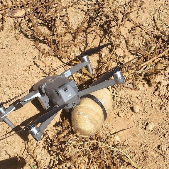 A picture released by Jordanian army shows a drone with a bundle of drugs attached. Sept. 26, 2023