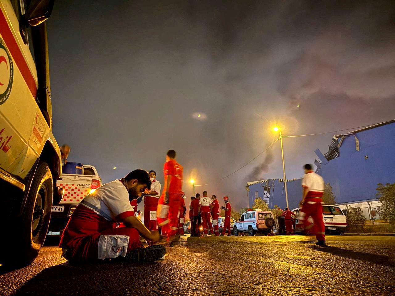 Iranian Red Crescent rescuers work following an explosion at the Shahid Rajaee port in Bandar Abbas, Iran, April 27, 2025.