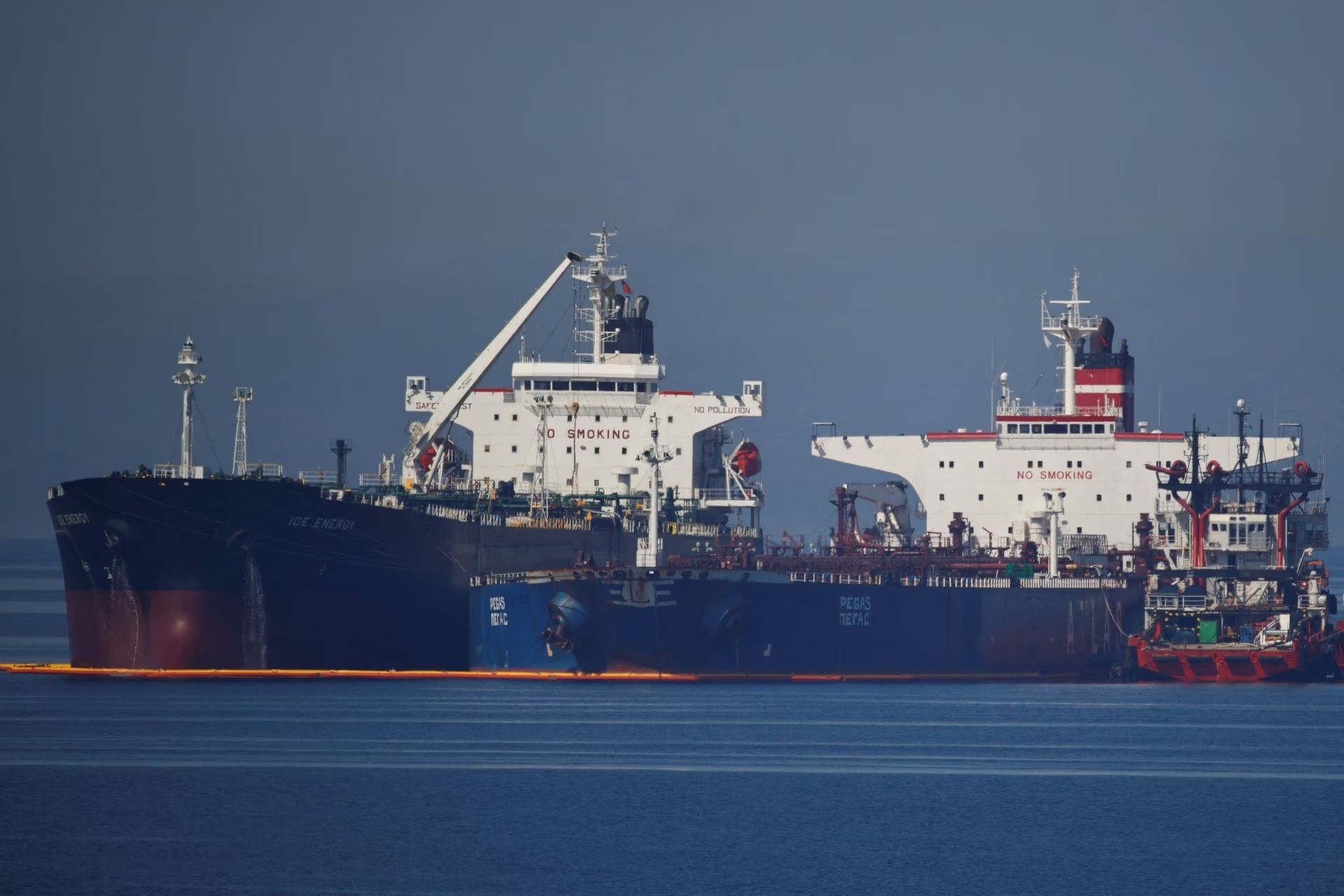 The Liberian-flagged oil tanker Ice Energy transfers crude oil from the Iranian-flagged oil tanker Lana (former Pegas), off the shore of Karystos, on the Island of Evia, Greece, May 26, 2022. 
