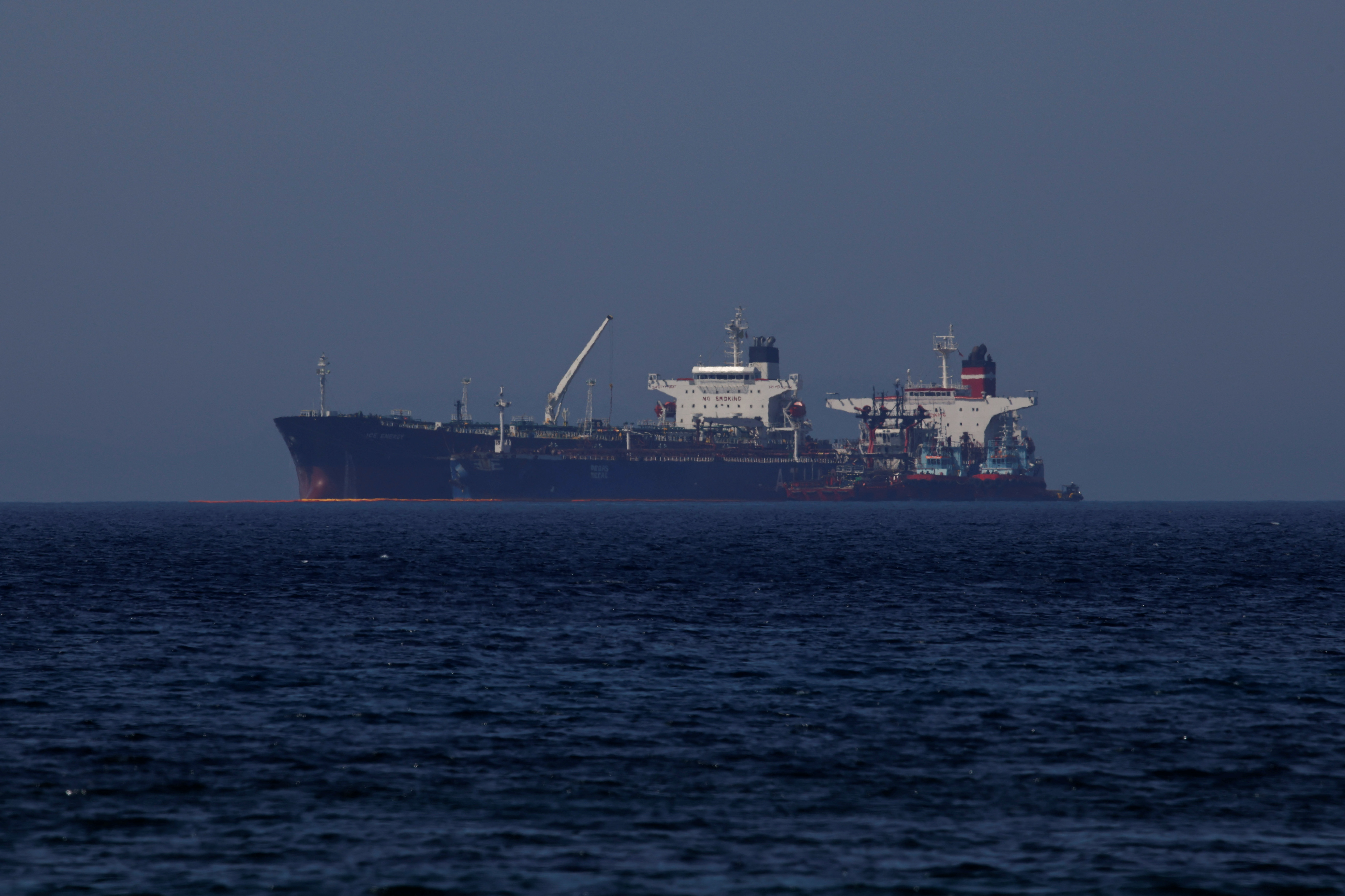 The Liberian-flagged oil tanker Ice Energy transfers crude oil from the Iranian-flagged oil tanker Lana (former Pegas), off the shore of Karystos, on the Island of Evia, Greece, May 26, 2022.