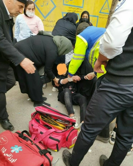 Medical personnel assisting a schoolgirl with symptoms of gas poisoning. March 6, 2023