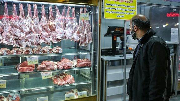 An Iranian shopper at the butcher's counter