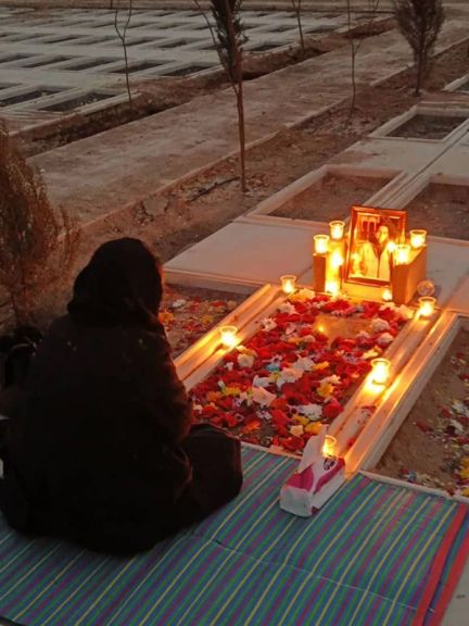 File photo shows the grave of Parnian Dabiri, 16, who was shot in the back of the head during protests in Baharestan, west of Tehran.