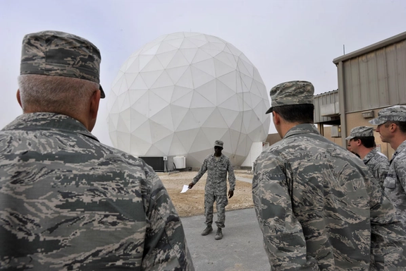A US officers briefs colleagues about the new Modernized Enterprise Terminal (MET) at Al Udeid Air Base, Qatar, Jan. 21, 2016 in this US Air Force file photo.