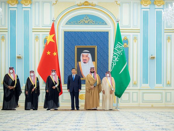 Saudi Crown Prince Mohammed Bin Salman stands with Chinese President Xi Jinping in Riyadh, Saudi Arabia December 8, 2022.