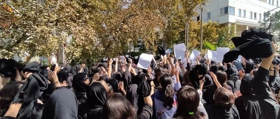 Iranian university students protesting against mandatory hijab