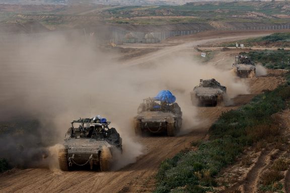 Israeli army vehicles return from the southern Gaza strip, in southern Israel, February 26, 2024.
