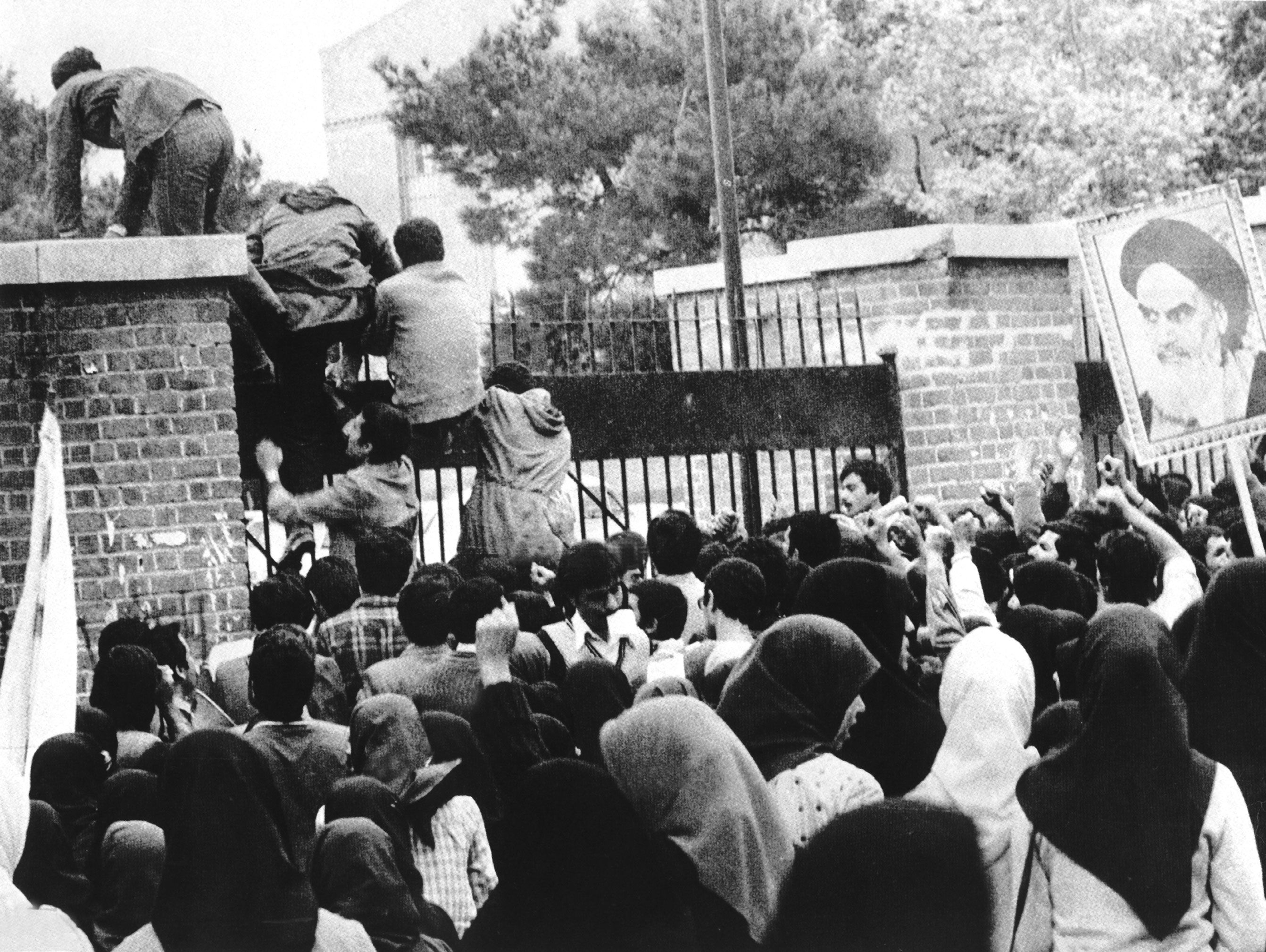 Iranian students storming US embassy in Tehran in 1979 