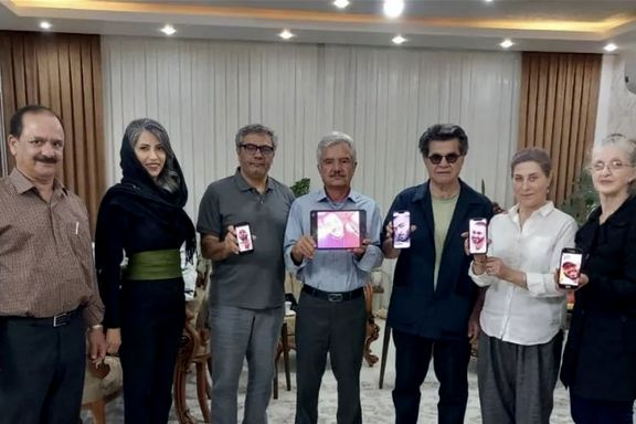 A group of prominent Iranian filmmakers with the family of detained rapper Toomaj Salehi on April 10, 2023