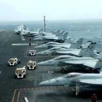 Iranian official rhetoric girds for war as US fleet nears