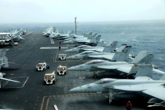 F/A-18F aircrafts are seen on the deck of USS Abraham Lincoln in the Gulf of Oman near the Strait of Hormuz in this file photo taken July 15, 2019
