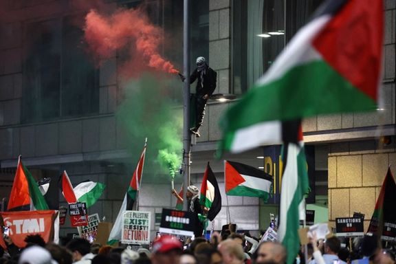 Pro-Palestinian demonstrators protest during the ongoing conflict between Israel and the Palestinian Islamist group Hamas, near the Israeli embassy in London, Britain, October 9, 2023.