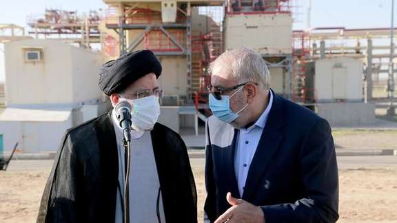 President Raisi and oil minister Owji visiting an oil facility in April 2022