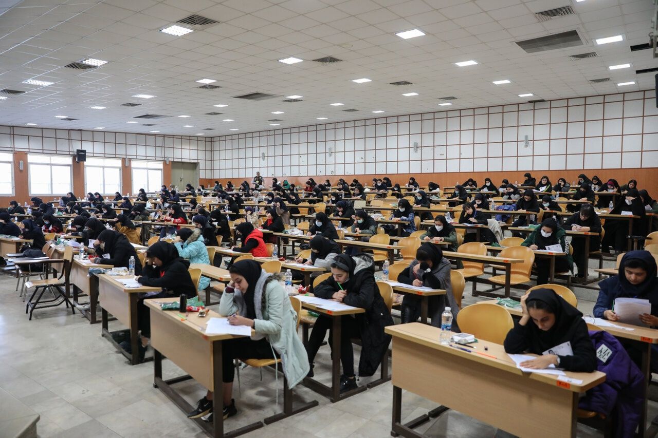 Students take an exam at a testing center in Iran.